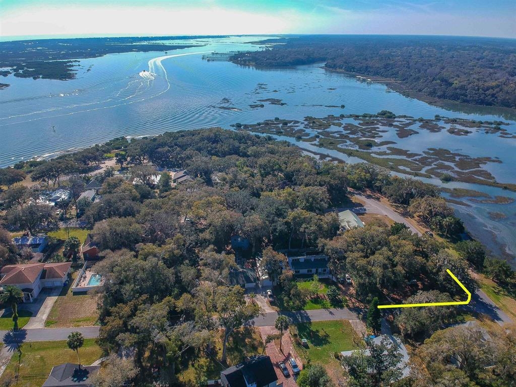 100 Saturn Road St. Augustine, FL 32086 - Photo 24 of 29 a view of a lake with a mountain