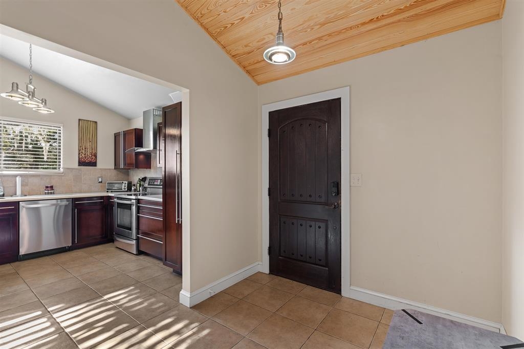 100 Saturn Road St. Augustine, FL 32086 - Photo 7 of 29 a view of a kitchen with a sink and dishwasher kitchen view