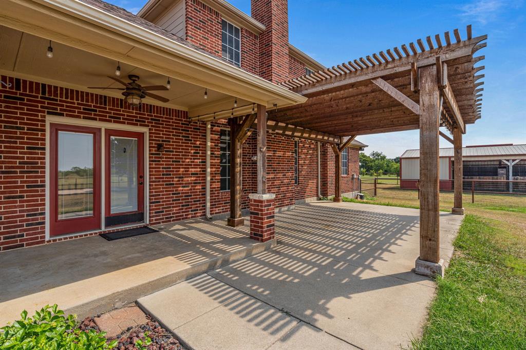 6501 Indian Trail Sanger, TX 76266 - Photo 30 of 39 View of patio with a pergola and ceiling fan
