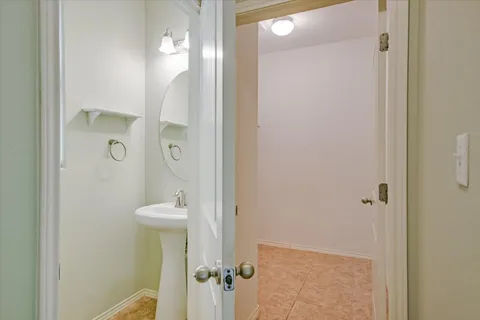 view of a bathroom with a shower and toilet