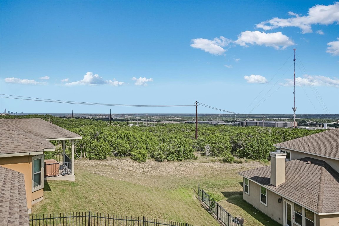 6203 Aviara Drive Austin, TX 78735 - Photo 22 of 33 a roof deck with a table and chairs