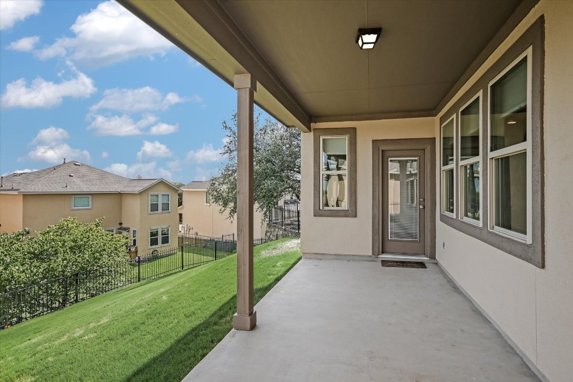 6203 Aviara Drive Austin, TX 78735 - Photo 25 of 33 a view of a house with backyard and porch