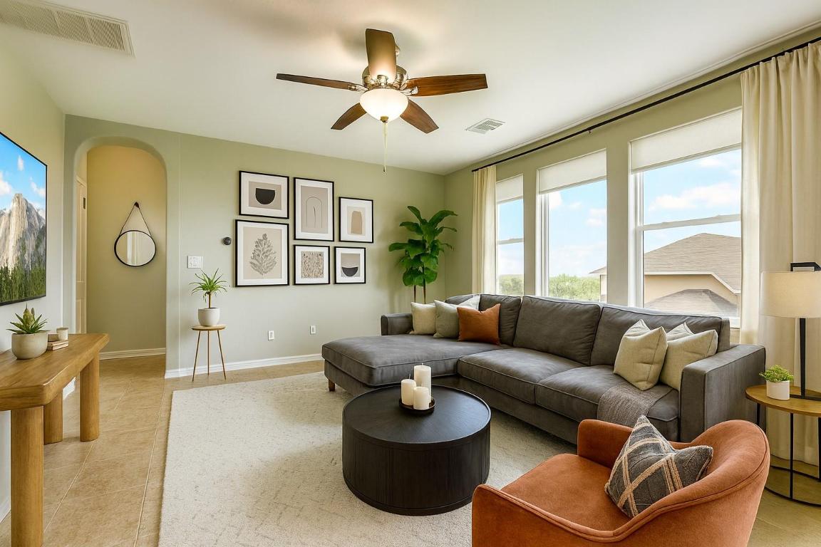 6203 Aviara Drive Austin, TX 78735 - Photo 3 of 33 a living room with furniture ceiling fan and a large window
