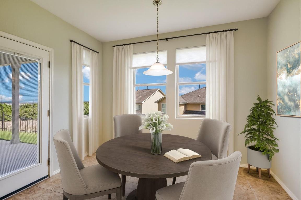 6203 Aviara Drive Austin, TX 78735 - Photo 4 of 33 a view of a dining room with furniture window and wooden floor