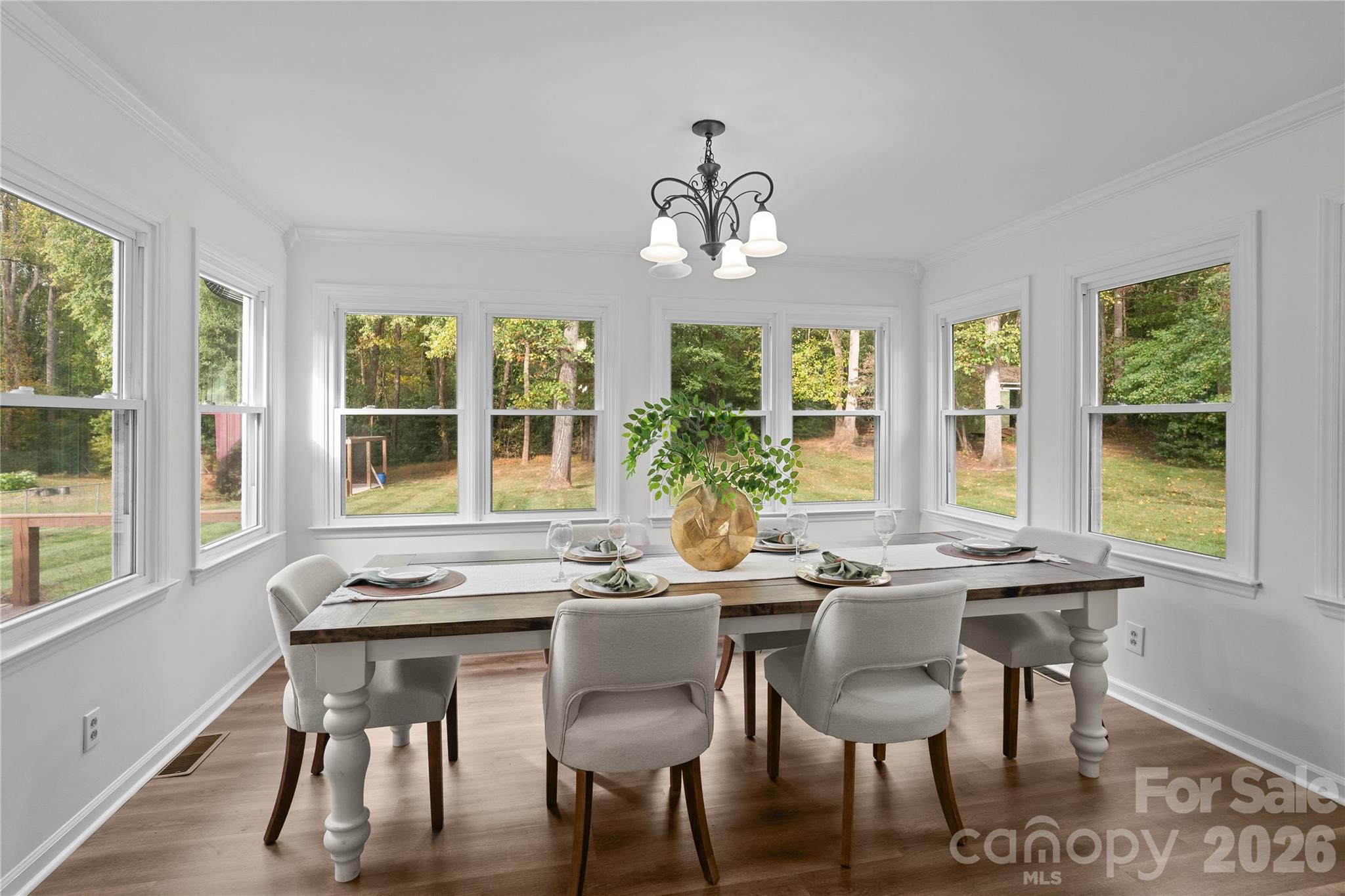 1335 Blacksnake Road Stanley, NC 28164 - Photo 10 of 31 a view of a dining room with furniture window and outside view