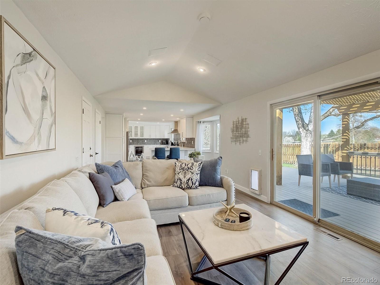 6432 South Birch Circle Centennial, CO 80121 - Photo 13 of 40 a living room with furniture and a table