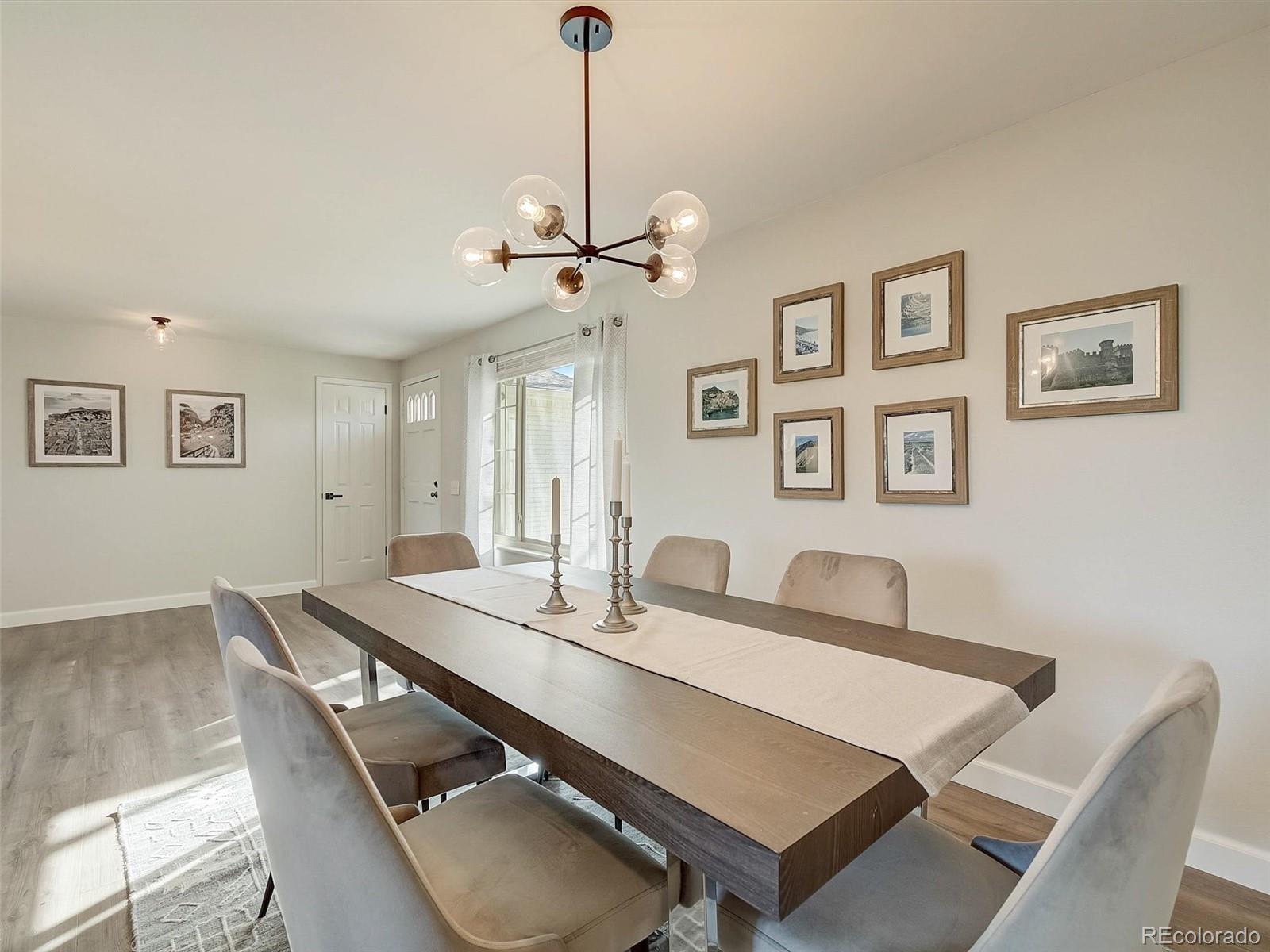 6432 South Birch Circle Centennial, CO 80121 - Photo 14 of 40 a dining room with a table and chairs