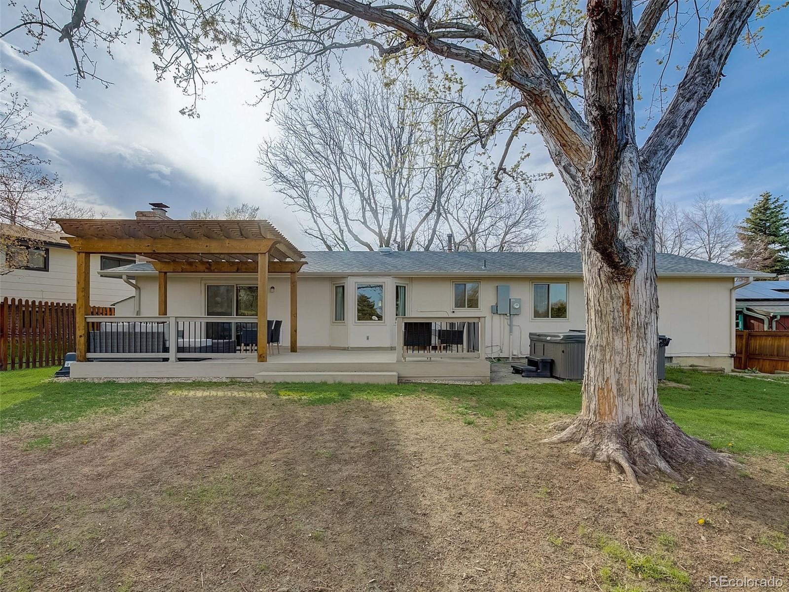 6432 South Birch Circle Centennial, CO 80121 - Photo 36 of 40 a view of a house with a yard porch and sitting area
