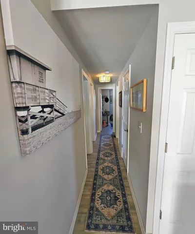 a bedroom with bed and a window