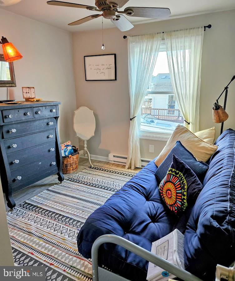 167 Cove Road Newport, NJ 08345 - Photo 25 of 37 a living room with furniture and a window