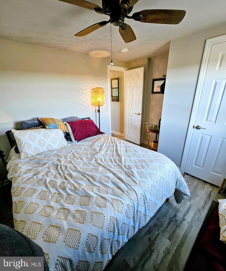 167 Cove Road Newport, NJ 08345 - Photo 27 of 37 a bedroom with a bed and a mirror