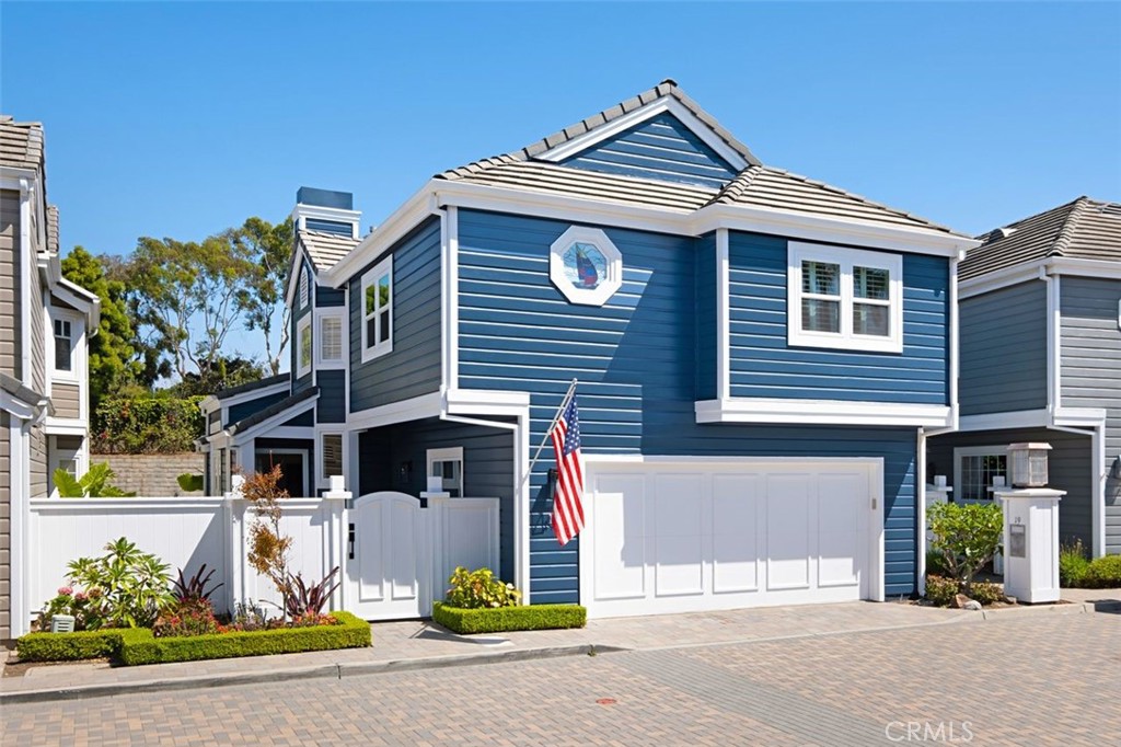 19 Chelsea Dana Point Dana Point, CA 92629 - Photo 1 of 1 a front view of a house with a garage