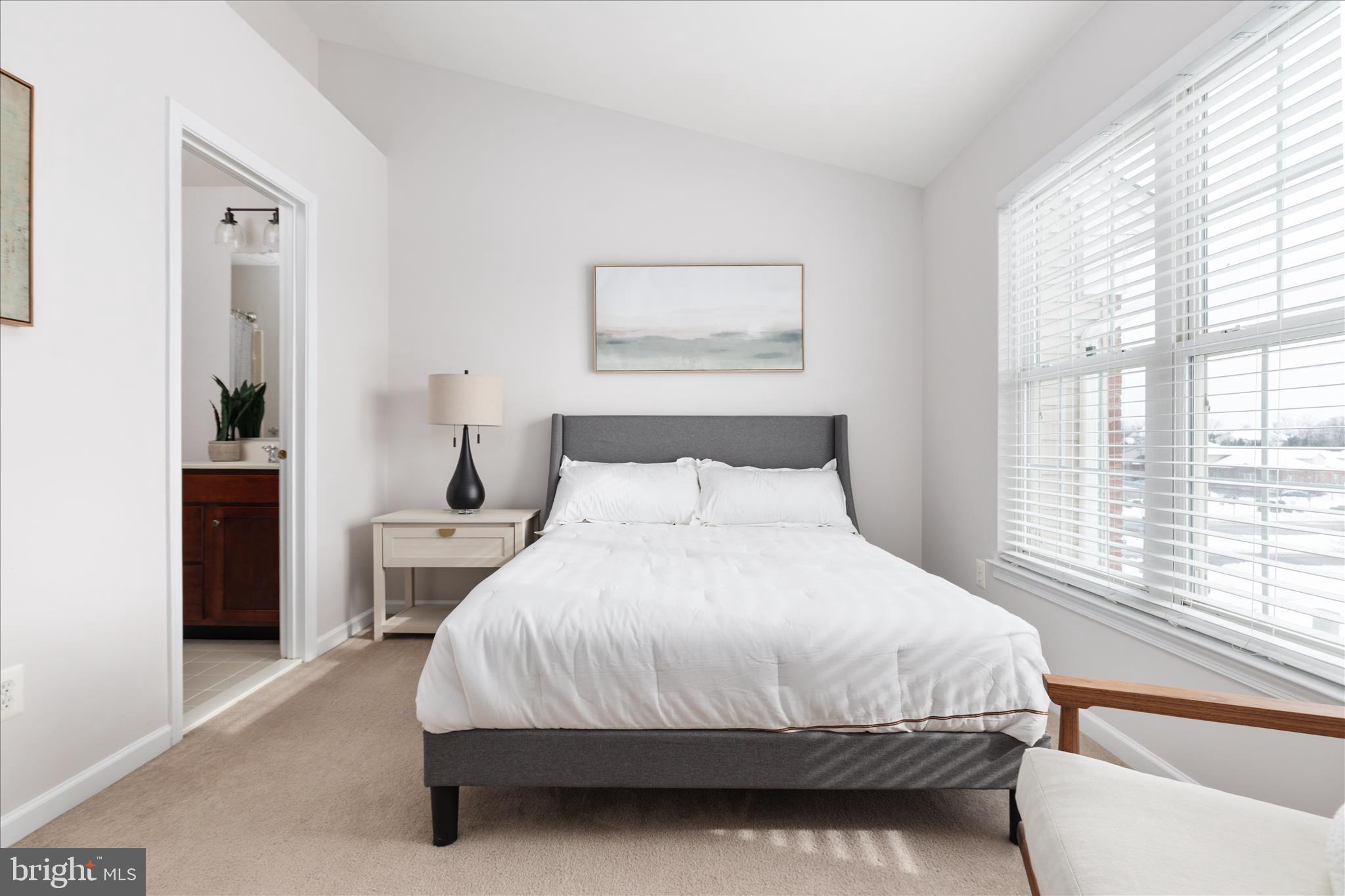 42824 Nations Street Chantilly, VA 20152 - Photo 17 of 26 a bedroom with a bed and a large window