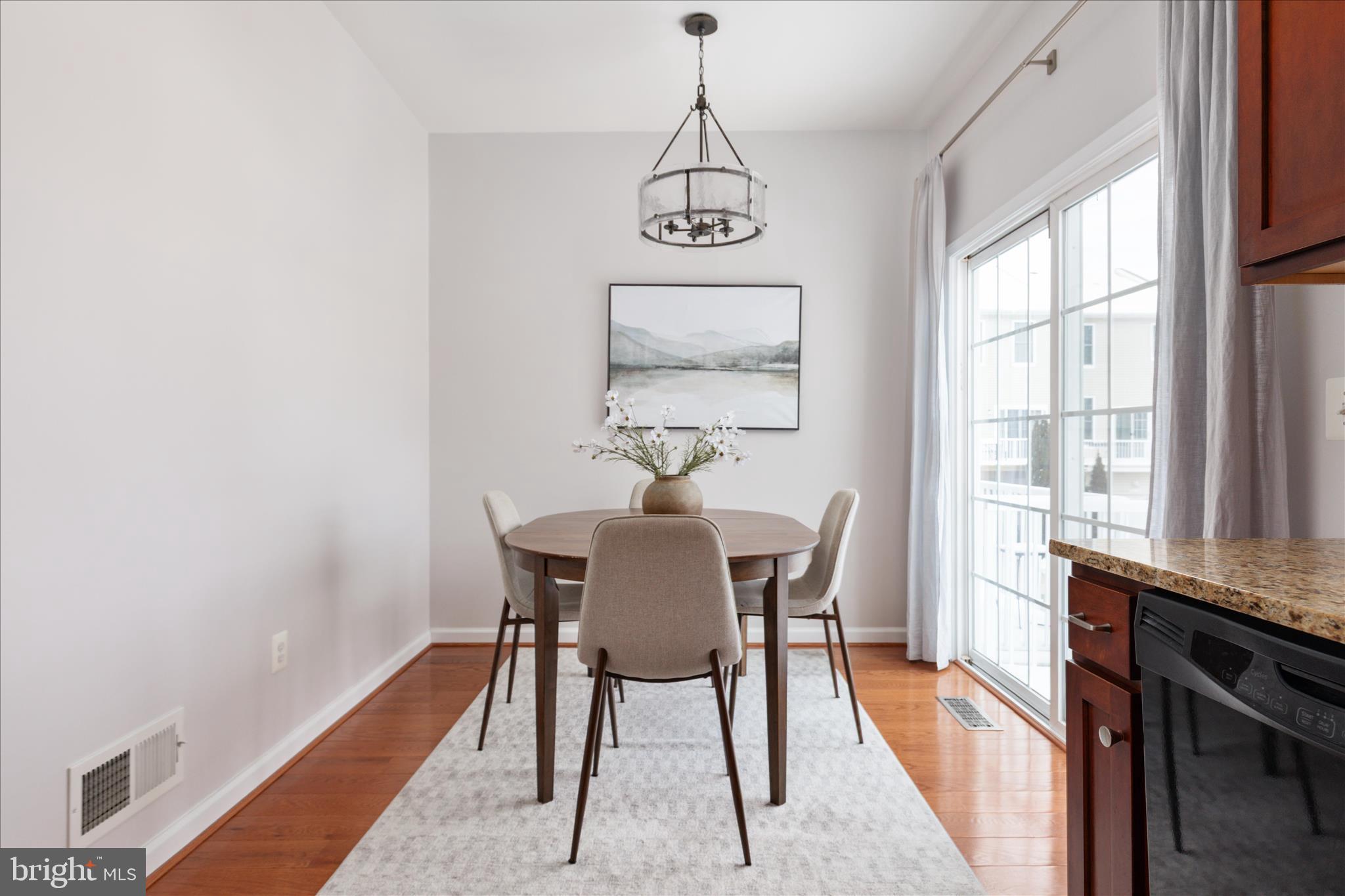 42824 Nations Street Chantilly, VA 20152 - Photo 9 of 26 a view of a dining room with furniture window and outside view