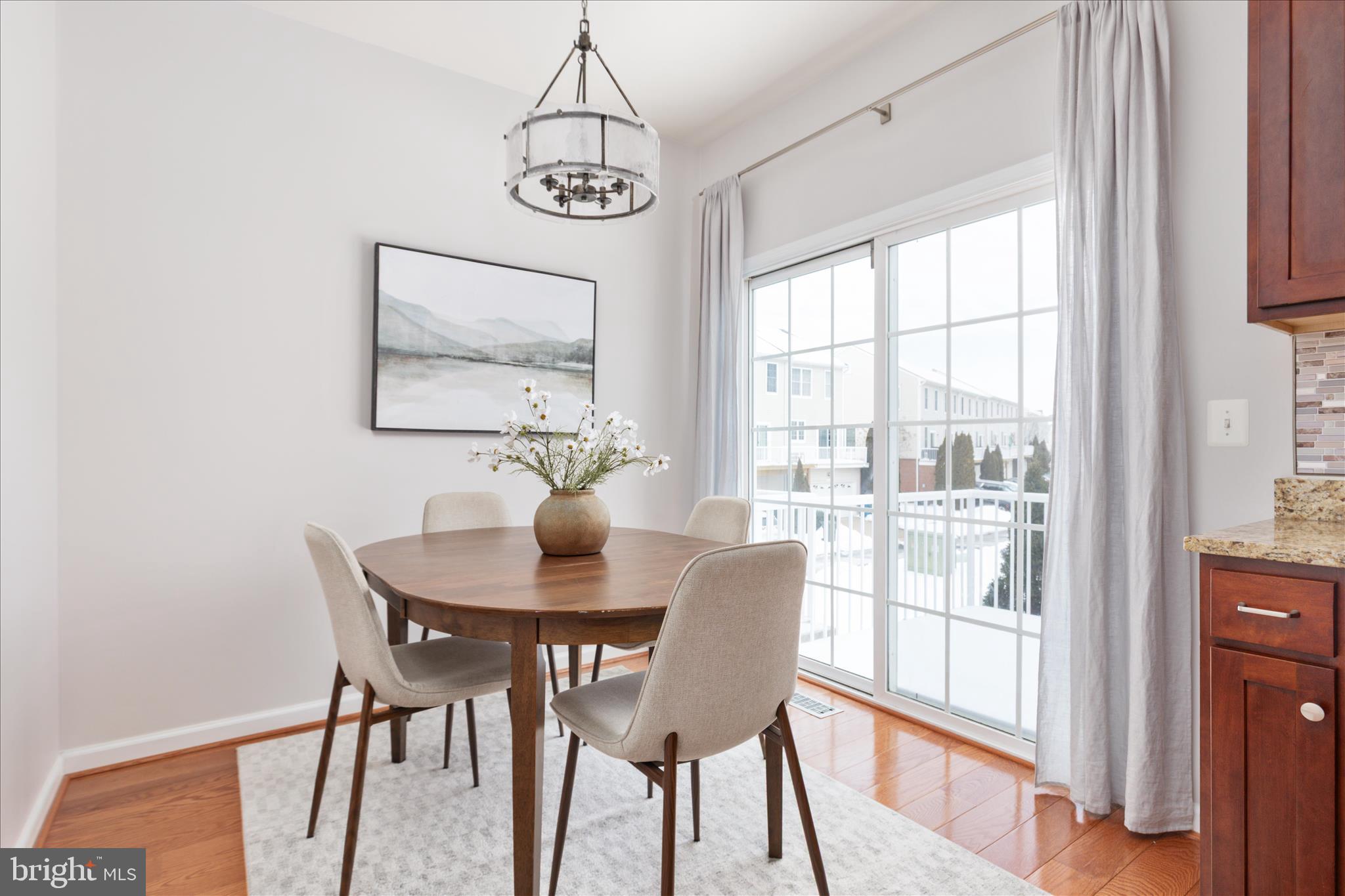 42824 Nations Street Chantilly, VA 20152 - Photo 10 of 26 a view of a dining room with furniture window and outside view