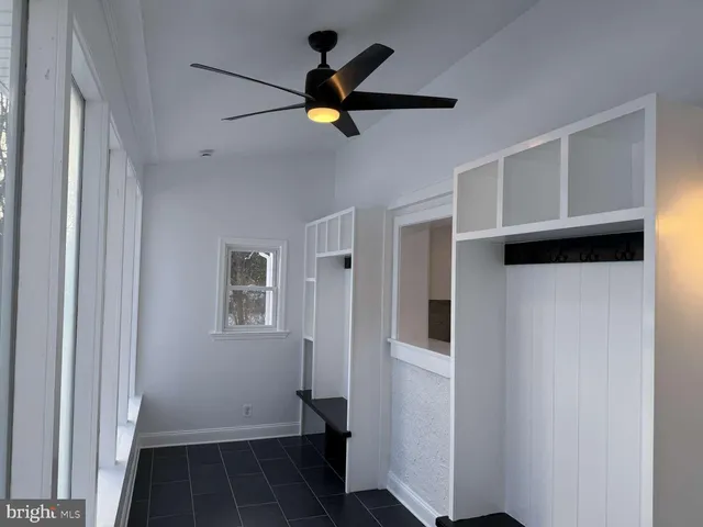 a view of front door and bedroom