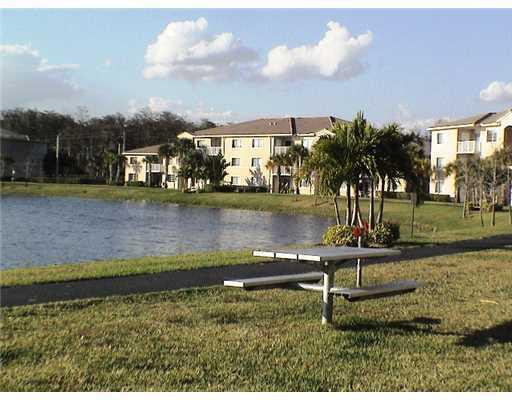 5035 Wiles Road, Unit 104 Coconut Creek, FL 33073 - Photo 11 of 11 Exterior Front