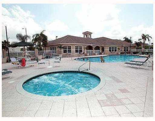 5035 Wiles Road, Unit 104 Coconut Creek, FL 33073 - Photo 9 of 11 Exterior Front