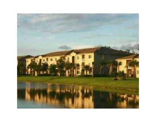 5035 Wiles Road, Unit 104 Coconut Creek, FL 33073 - Photo 10 of 11 Exterior Front