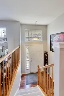 a view of hallway with livingroom