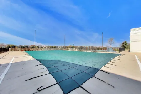 a view of a street with a yard