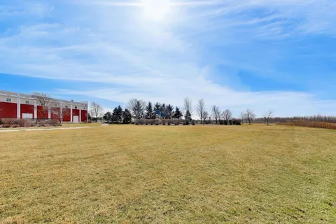a view of an ocean beach and city