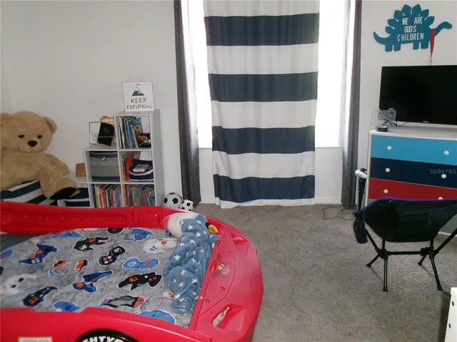 a bathroom with a sink toilet and mirror