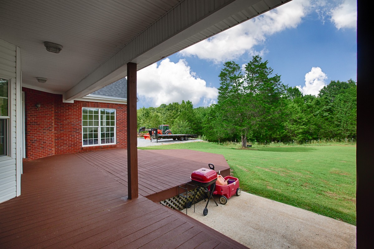 193 Dellrose Road Dellrose, TN 38453 - Photo 8 of 31 a view of a porch with furniture and garden