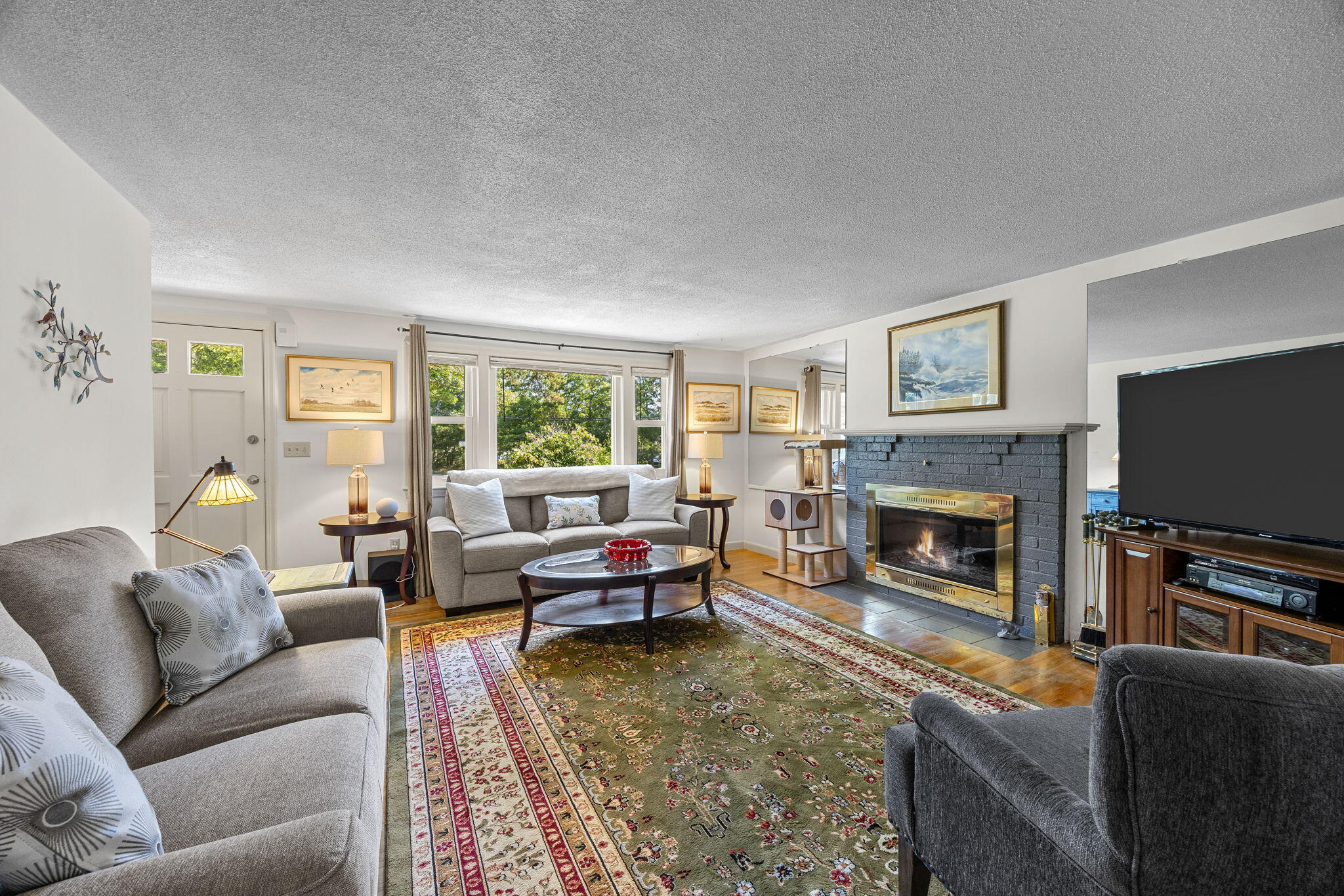 21 Brian Lane Hyannis, MA 02601 - Photo 17 of 38 living room with wood burning fireplace