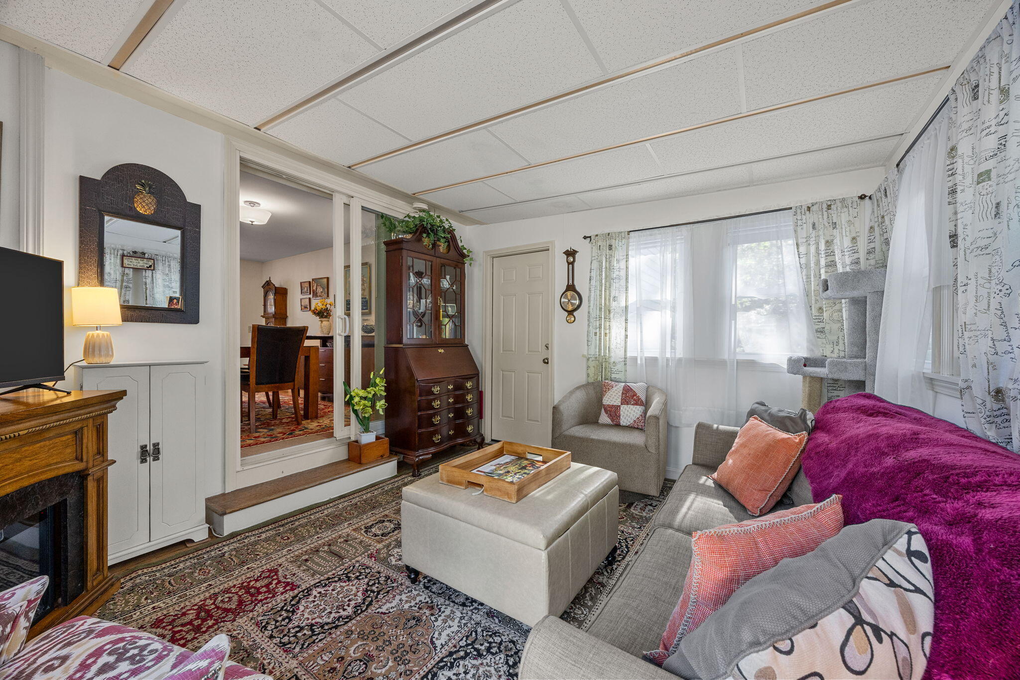 21 Brian Lane Hyannis, MA 02601 - Photo 28 of 38 a living room with furniture and a flat screen tv