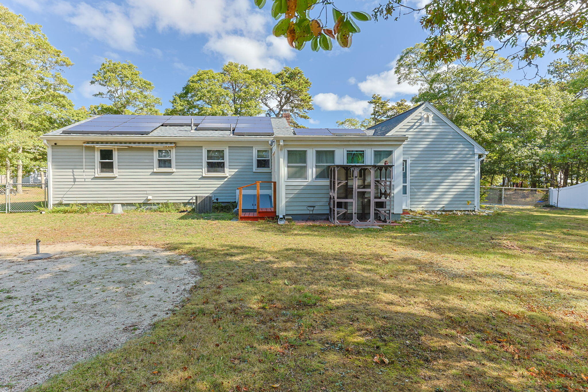 21 Brian Lane Hyannis, MA 02601 - Photo 8 of 38 a view of a house with pool and chairs