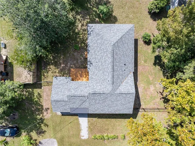 an aerial view of residential house with outdoor space