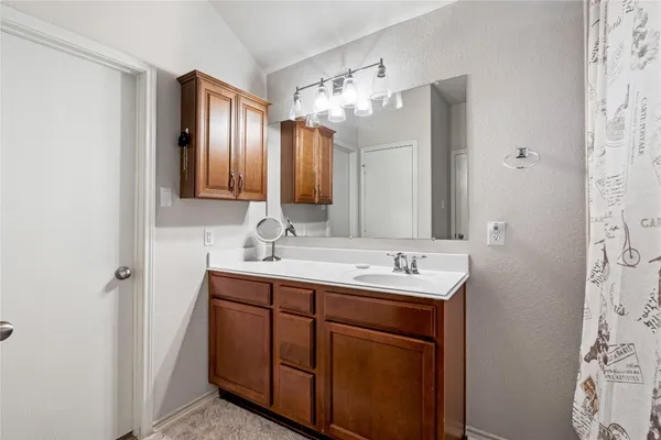 a bathroom with a double vanity sink mirror and double