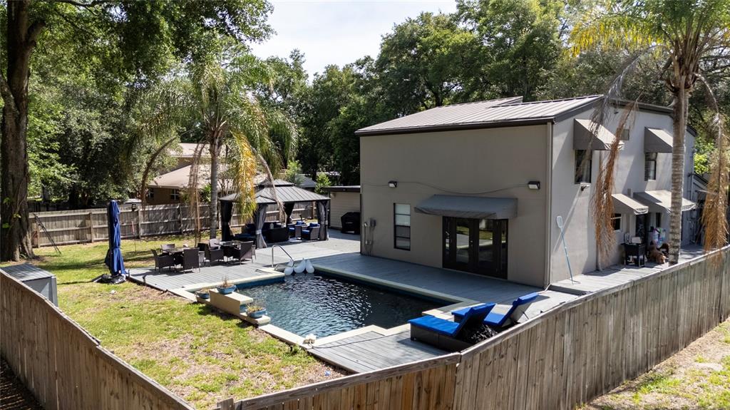 357 Ridgewood Street Altamonte Springs, FL 32701 - Photo 6 of 36 a view of a couches on the roof deck