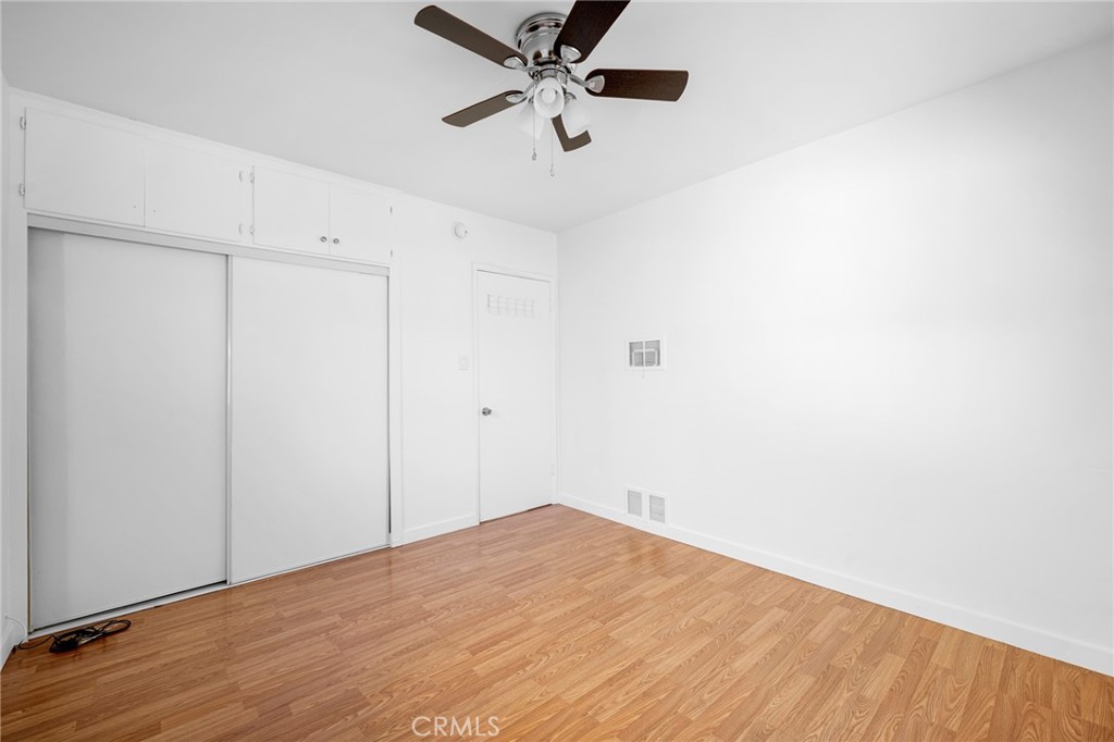 10230 Silverton Avenue, Unit 1 Tujunga, CA 91042 - Photo 11 of 26 a view of a big room with wooden floor