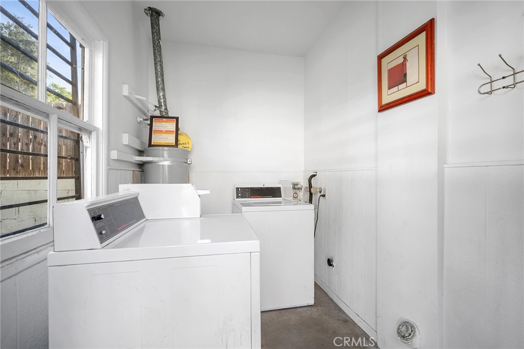 10230 Silverton Avenue, Unit 1 Tujunga, CA 91042 - Photo 18 of 26 a utility room with dryer and washer
