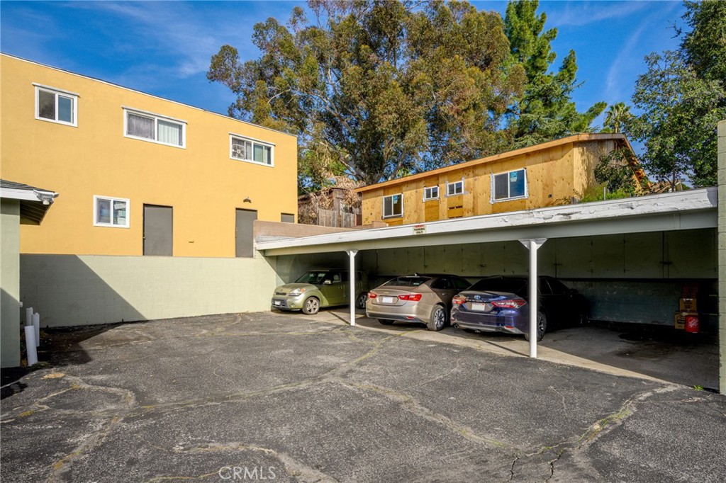 10230 Silverton Avenue, Unit 1 Tujunga, CA 91042 - Photo 23 of 26 a car parked in front of white building