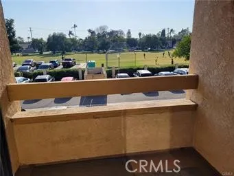 a view of a swimming pool and a yard