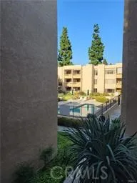 a view of building with outdoor space and seating area