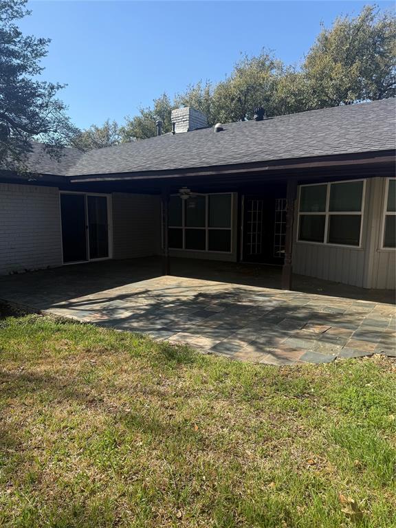 14922 Hillcrest Road Dallas, TX 75248 - Photo 19 of 19 a front view of a house with a yard