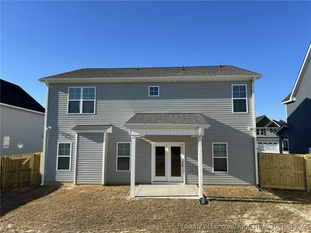 a front view of a house with glass windows