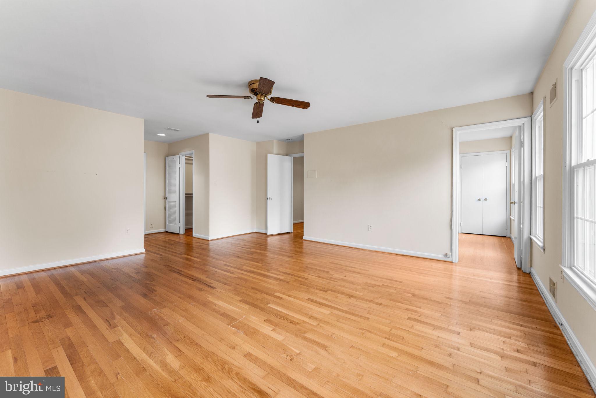9 Snug Hill Court Potomac, MD 20854 - Photo 23 of 66 a view of empty room with wooden floor and ceiling fan