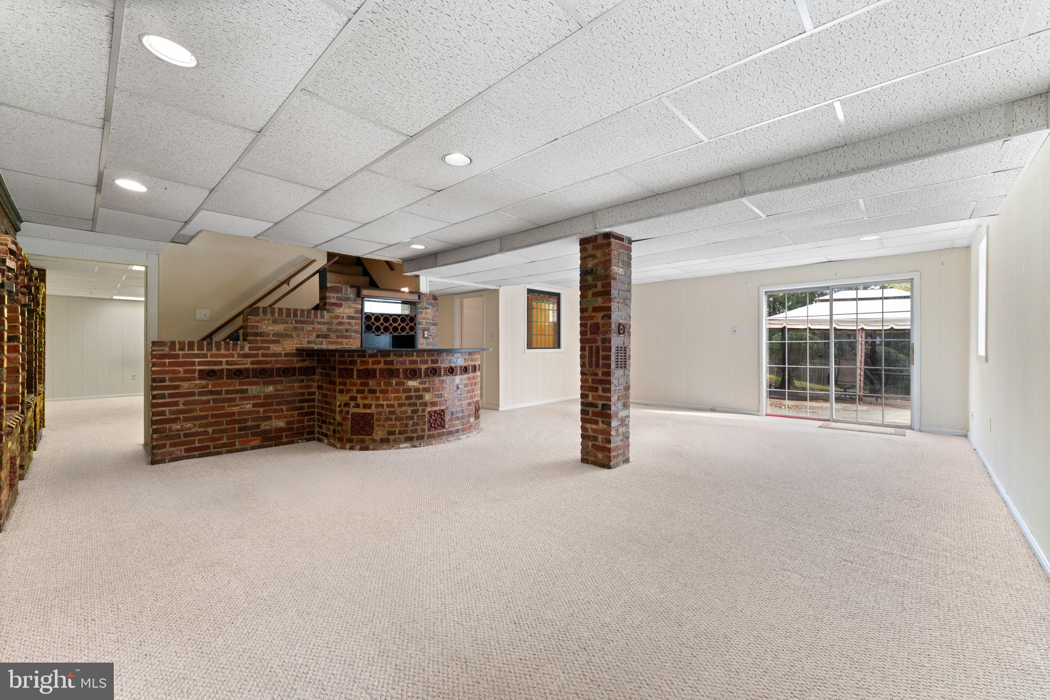 9 Snug Hill Court Potomac, MD 20854 - Photo 35 of 66 a view of an empty room with glass door