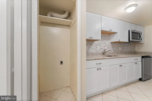 a black and white photo of a bench