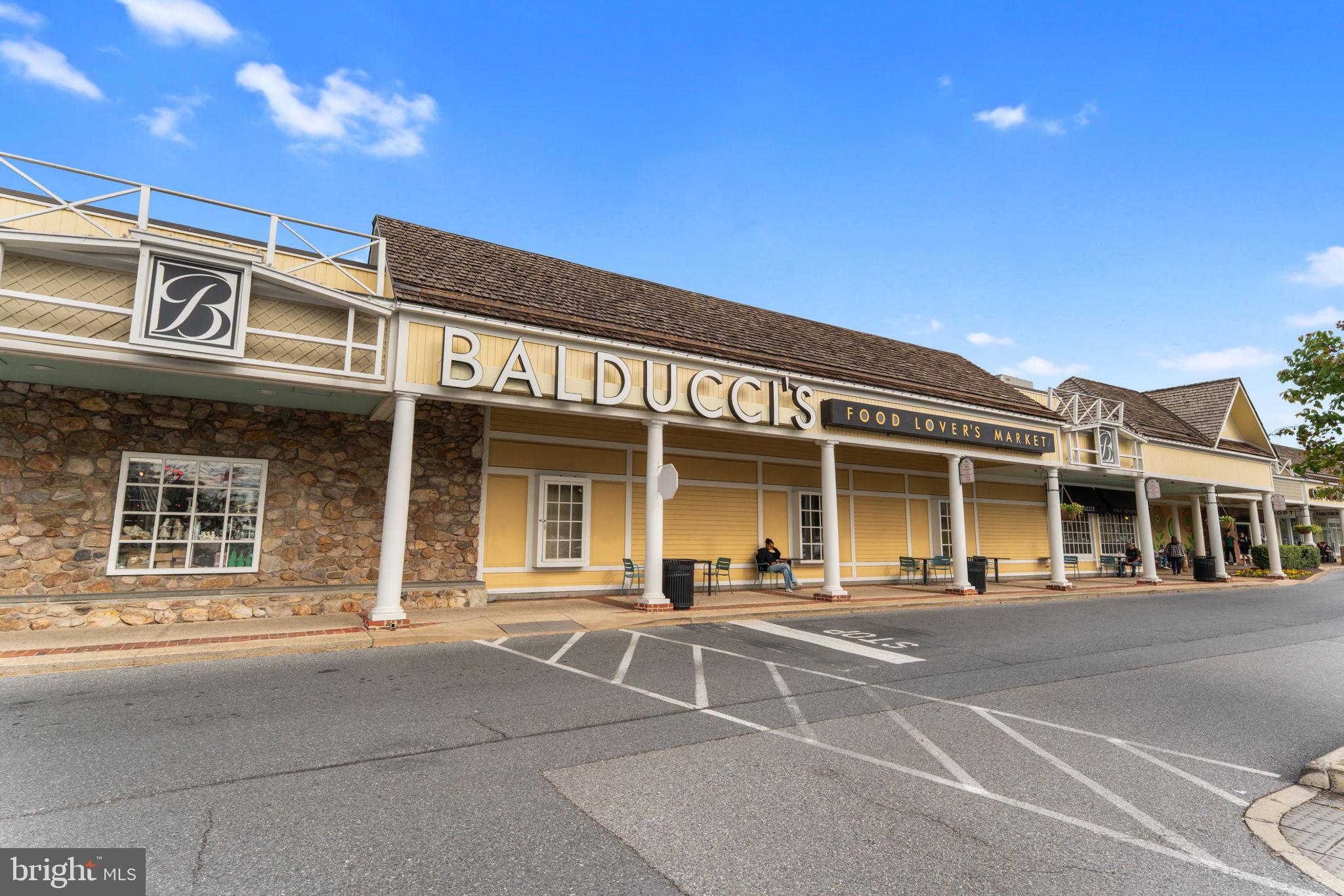 9 Snug Hill Court Potomac, MD 20854 - Photo 56 of 66 a view of a building with a street view