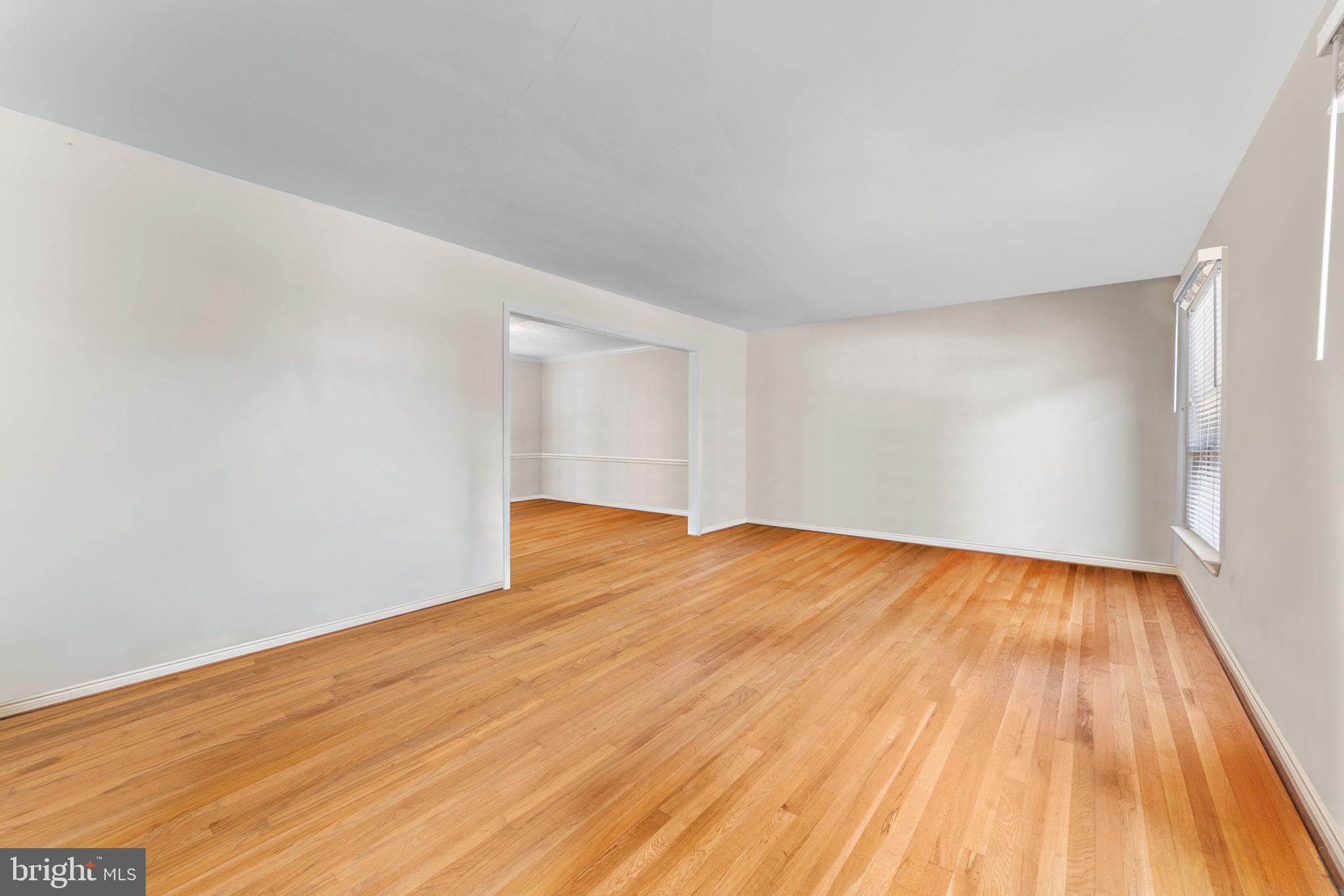 9 Snug Hill Court Potomac, MD 20854 - Photo 10 of 66 a view of empty room with wooden floor