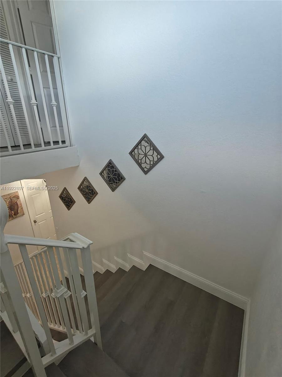 17847 Northwest 74th Path Hialeah, FL 33015 - Photo 22 of 35 a view of an entryway with staircase