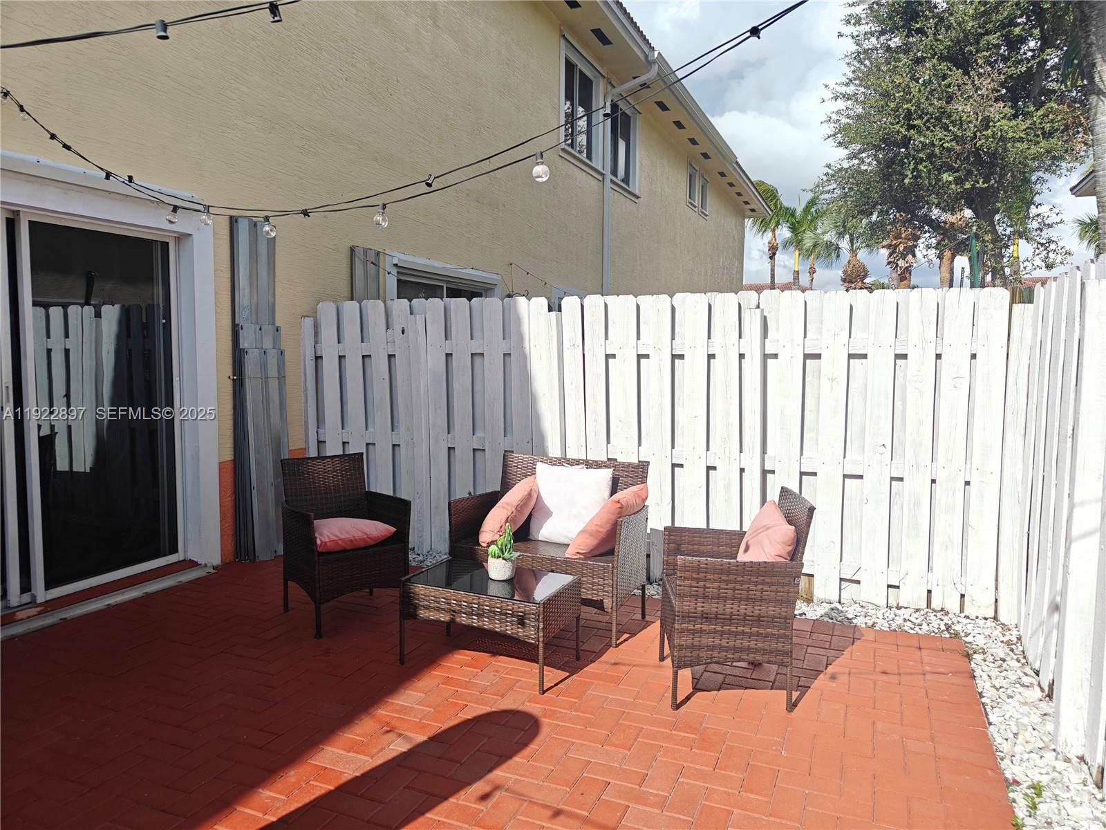 17847 Northwest 74th Path Hialeah, FL 33015 - Photo 31 of 35 a outdoor space with patio furniture