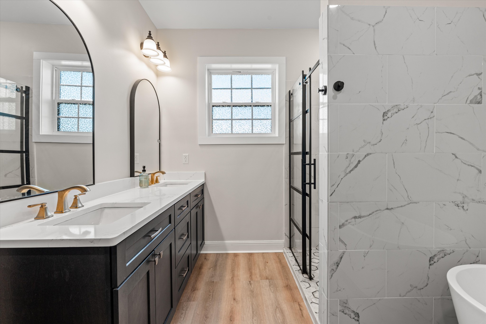 5195 Pleasant View Road Morrison, TN 37357 - Photo 23 of 45 a bathroom with a double vanity sink a toilet and a mirror