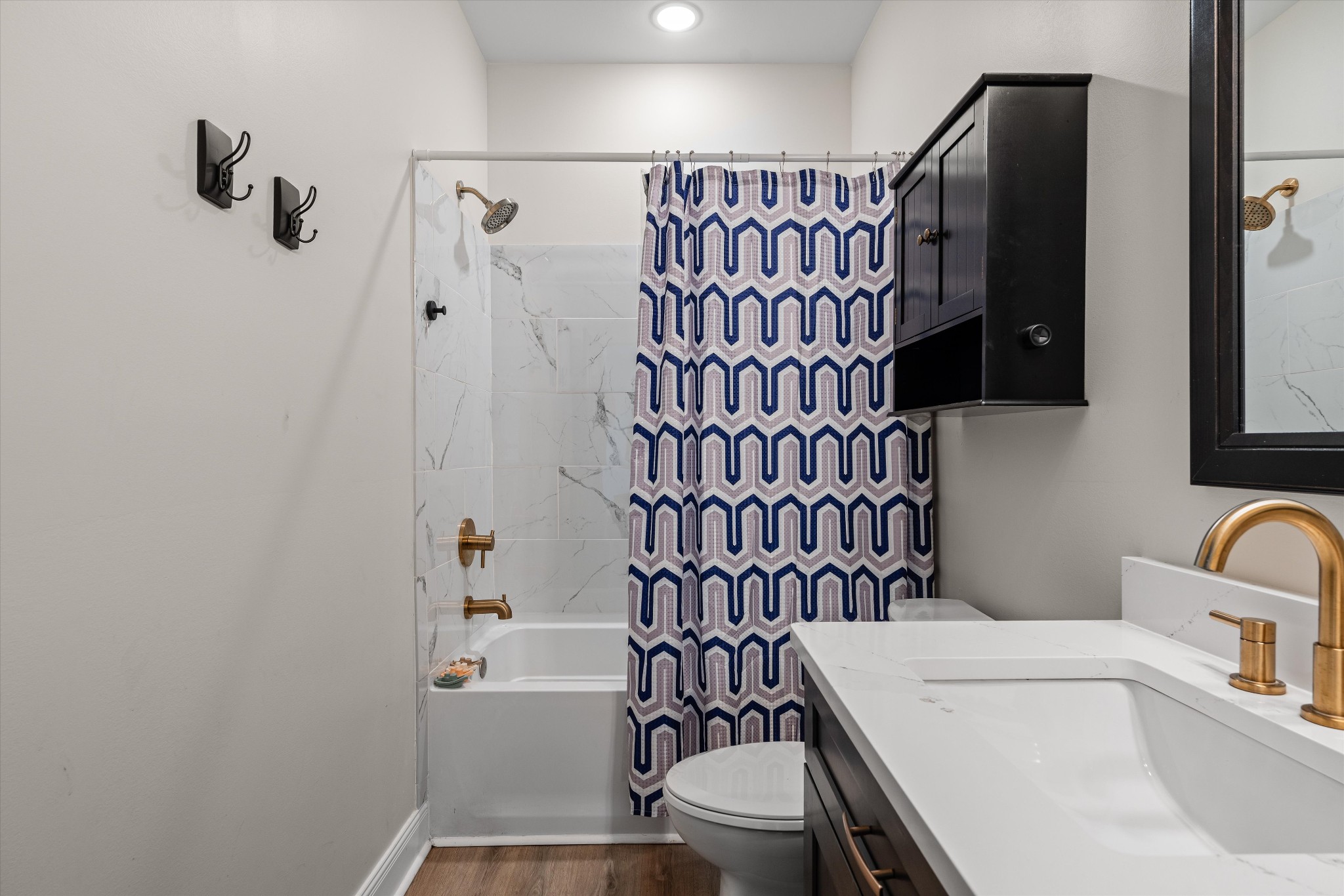 5195 Pleasant View Road Morrison, TN 37357 - Photo 35 of 45 a bathroom with a sink a toilet and shower